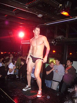 "Male_stripper_San_Francisco_January_2009.jpg" by User:Rotatebot