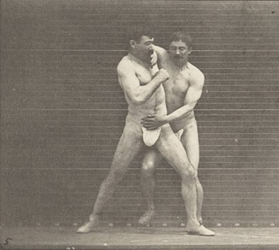 "Two_men_boxing_in_thong_underwear_(rbm-QP301M8-1887-331a~5).jpg" by User:Fæ