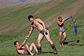 "Mongolian_wrestlers.jpg" by User:Arthistorian1977