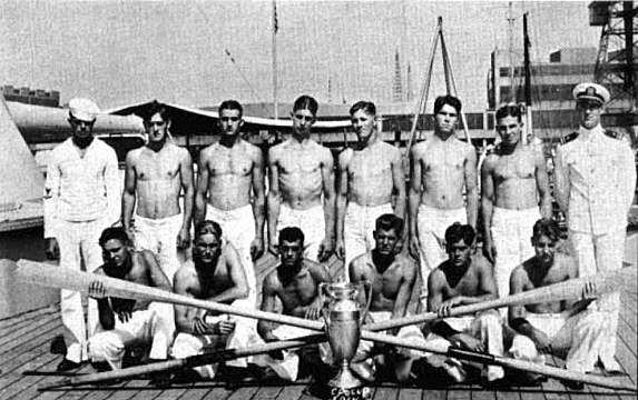 "USS_Arizona_(BB-39)_whaleboat_crew_with_Battenberg_Cup_1931.jpg" by User:Cobatfor
