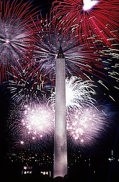 "Fourth_of_July_fireworks_behind_the_Washington_Monument,_1986.jpg" by User:Soerfm