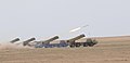 "Kuwait_BM-30_Smerch_launchers_are_firing,_2021.jpg" by User:Remitamine