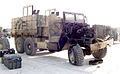 "Iraq-gun_truck_hit_by_IED.jpg" by User:Raoulduke47